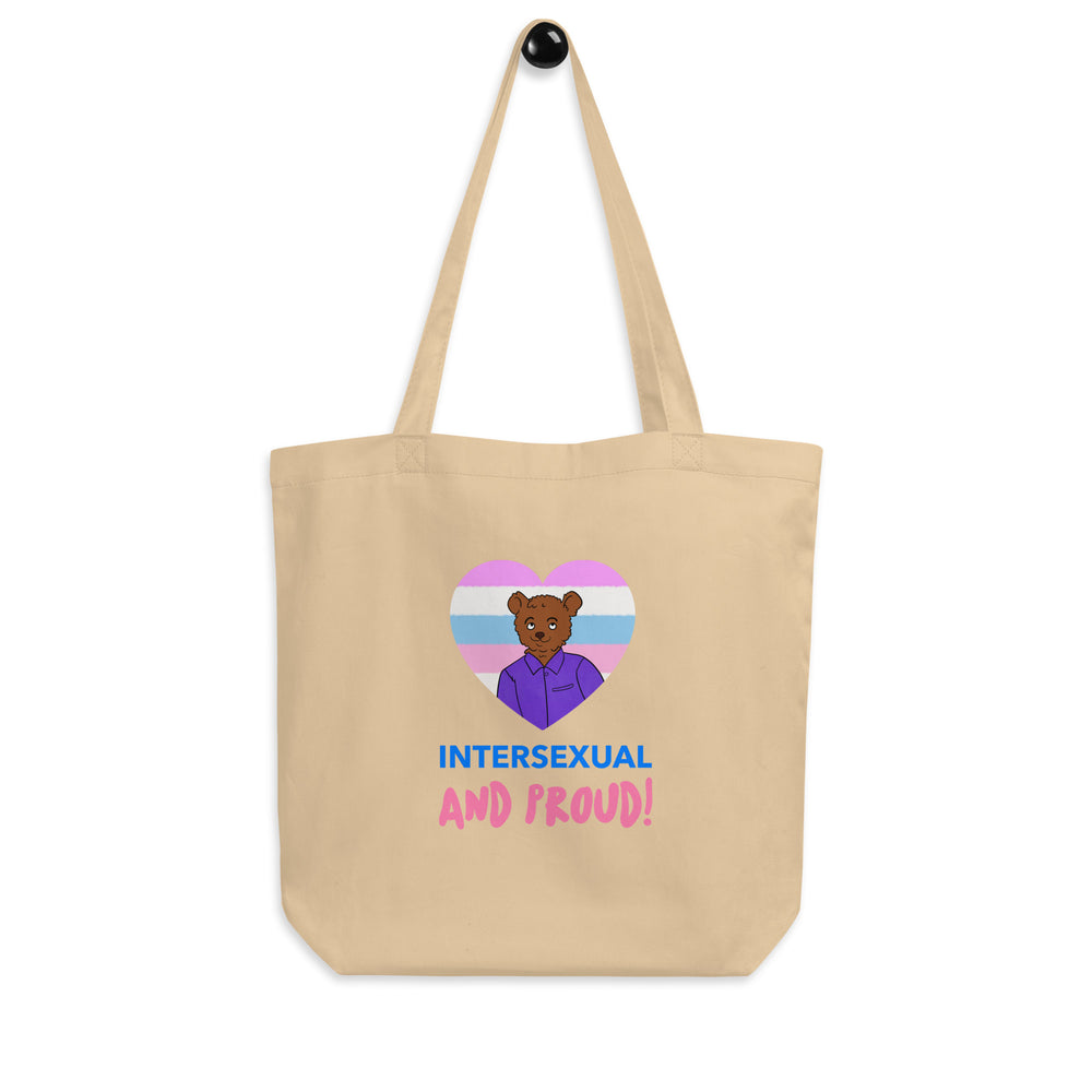 Oyster canvas tote bag with a heart graphic, bear illustration, and “INTERSEXUAL AND PROUD!” text