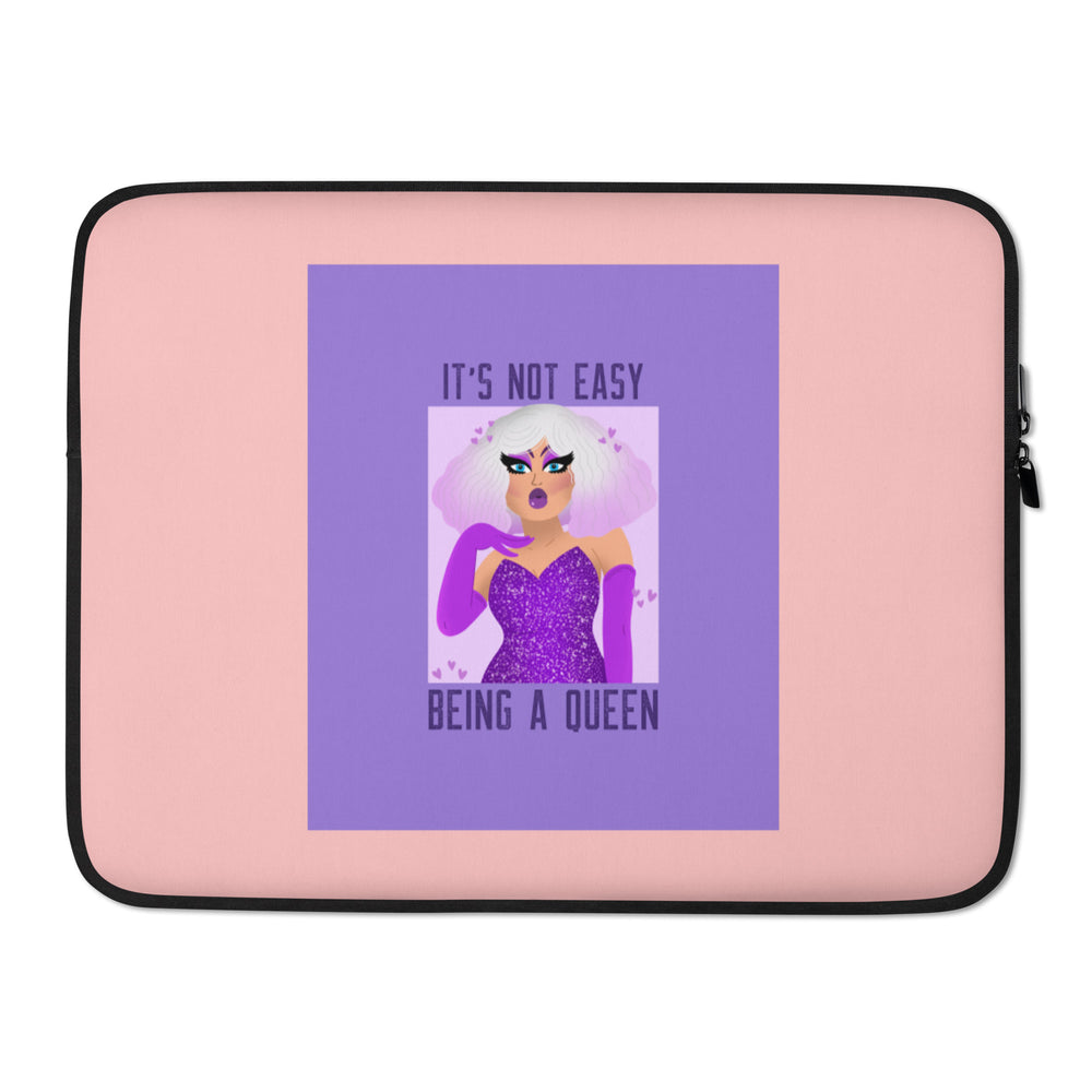 Pink laptop sleeve with a purple queen illustration and “IT’S NOT EASY BEING A QUEEN” text