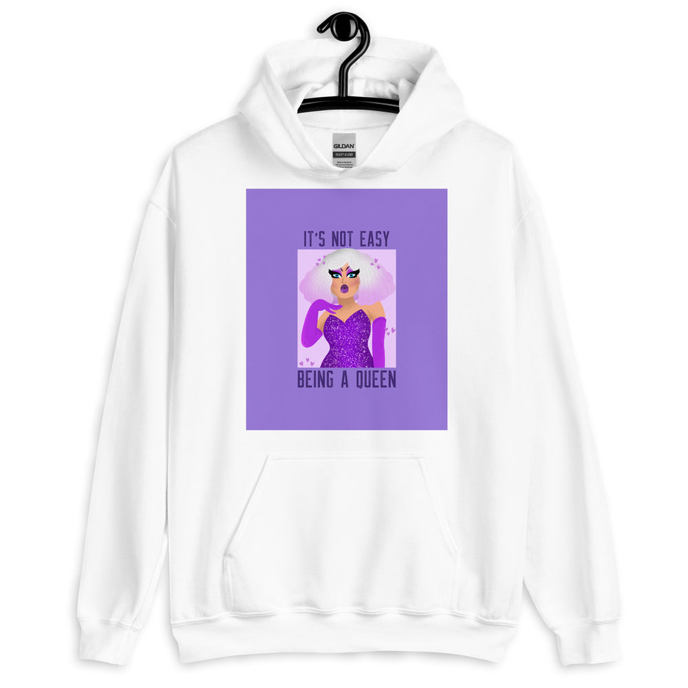 Front view of a white hoodie reading “IT’S NOT EASY BEING A QUEEN,” with a purple queen illustration