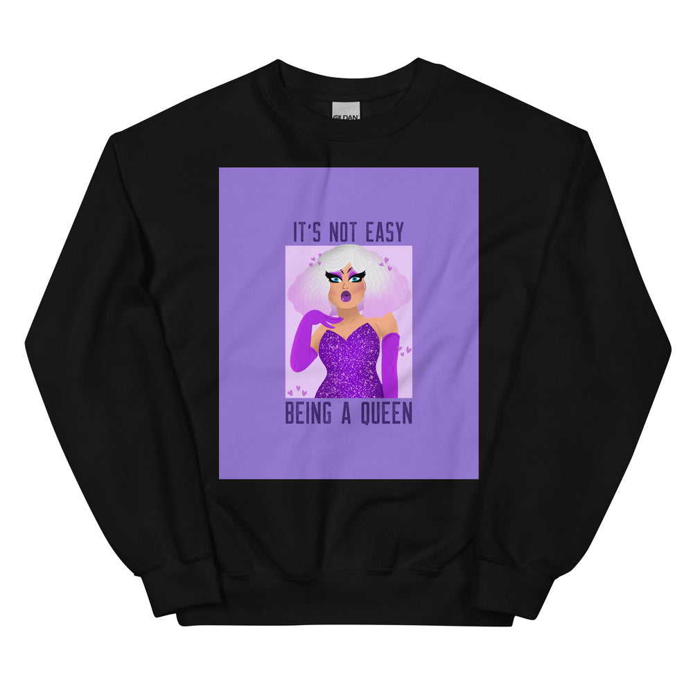 Front view of a black sweatshirt with purple queen graphic and “IT’S NOT EASY BEING A QUEEN” text
