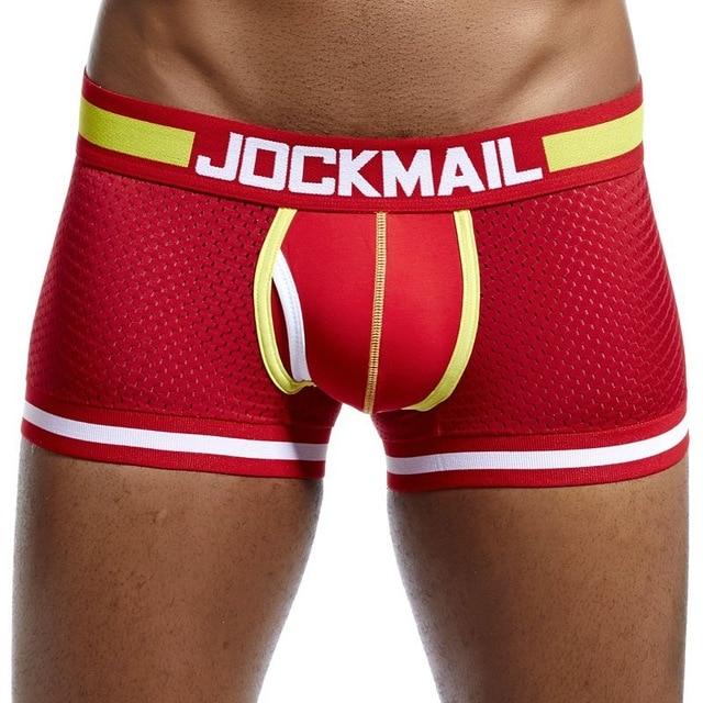 Red mesh boxer briefs with yellow trim, white leg stripes, and JOCKMAIL waistband