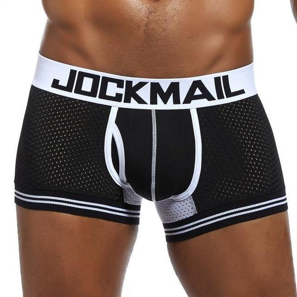 Close-up of black mesh boxer briefs with white JOCKMAIL waistband and striped leg bands