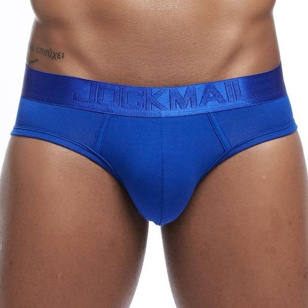 Front view of blue Jockmail brief underwear with a wide branded waistband