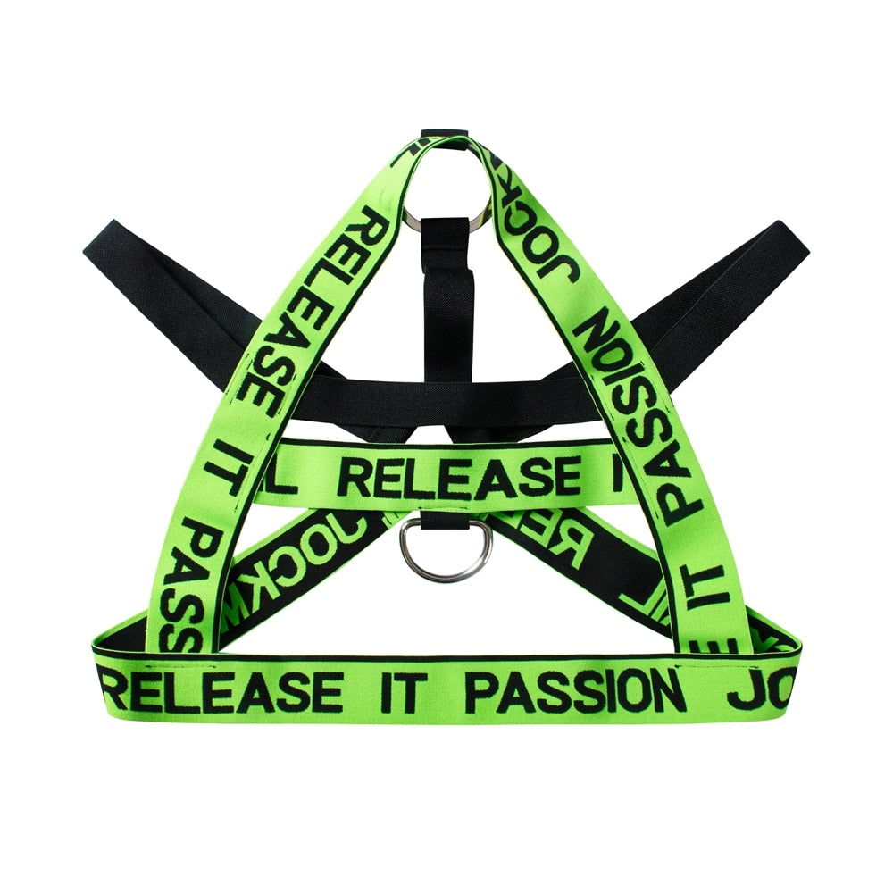 Neon green and black elastic chest harness laid flat, with silver D-ring and “RELEASE IT PASSION” text