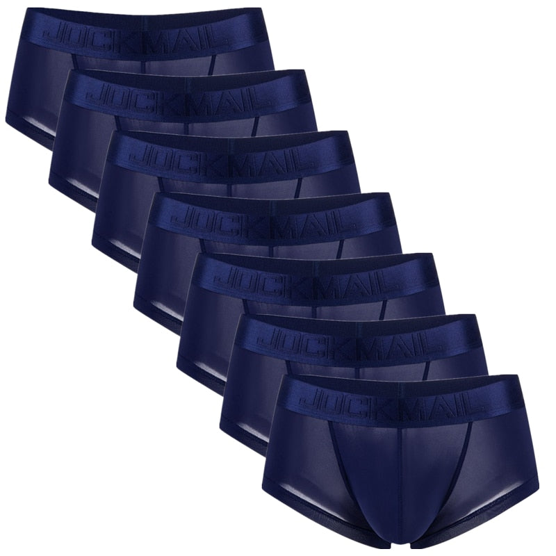 Seven navy ultra-thin mesh boxer briefs arranged diagonally, with branded waistbands