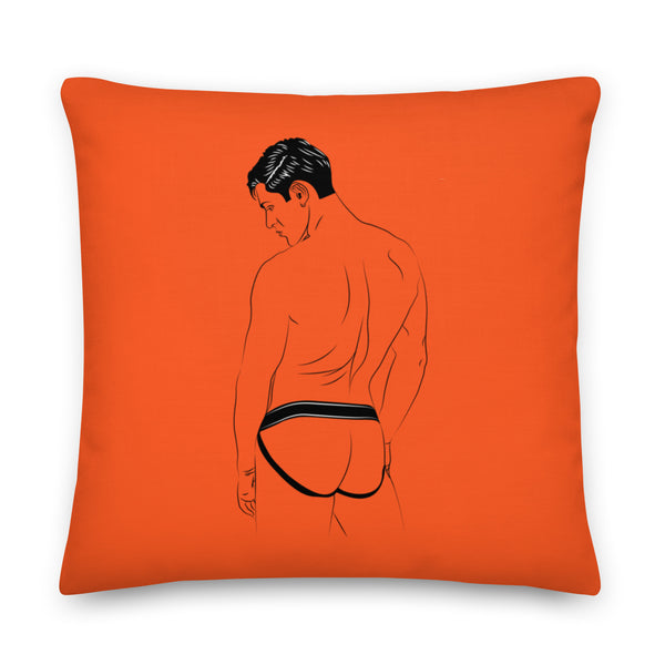 Orange square pillow featuring a stylized rear-view illustration of a man in a black jockstrap