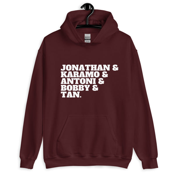Front view of a maroon hoodie with white text listing Jonathan, Karamo, Antoni, Bobby, and Tan