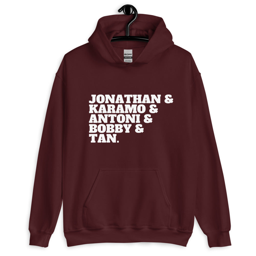 Front view of a maroon hoodie with white text listing Jonathan, Karamo, Antoni, Bobby, and Tan