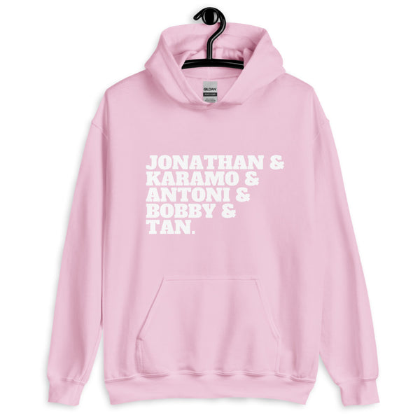 Pink pullover hoodie on a hanger with white text reading “JONATHAN & KARAMO & ANTONI & BOBBY & TAN.”