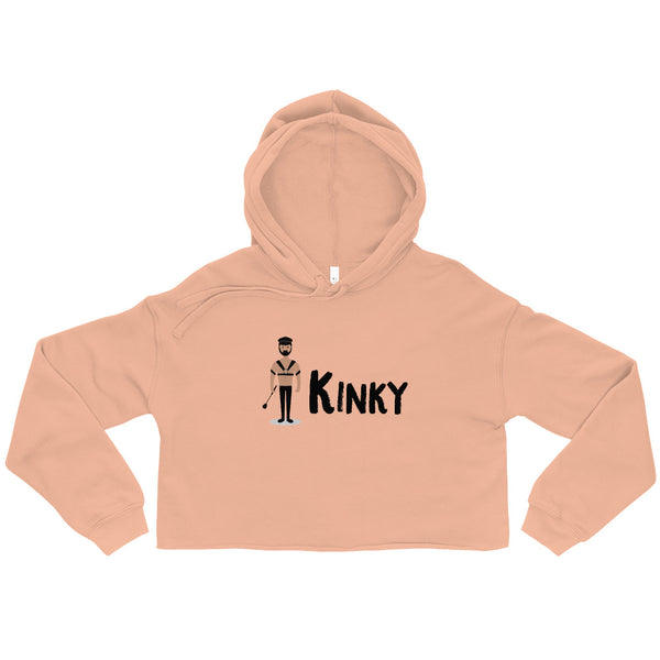 Front view of a peach cropped hoodie with a hood and black “KINKY” graphic