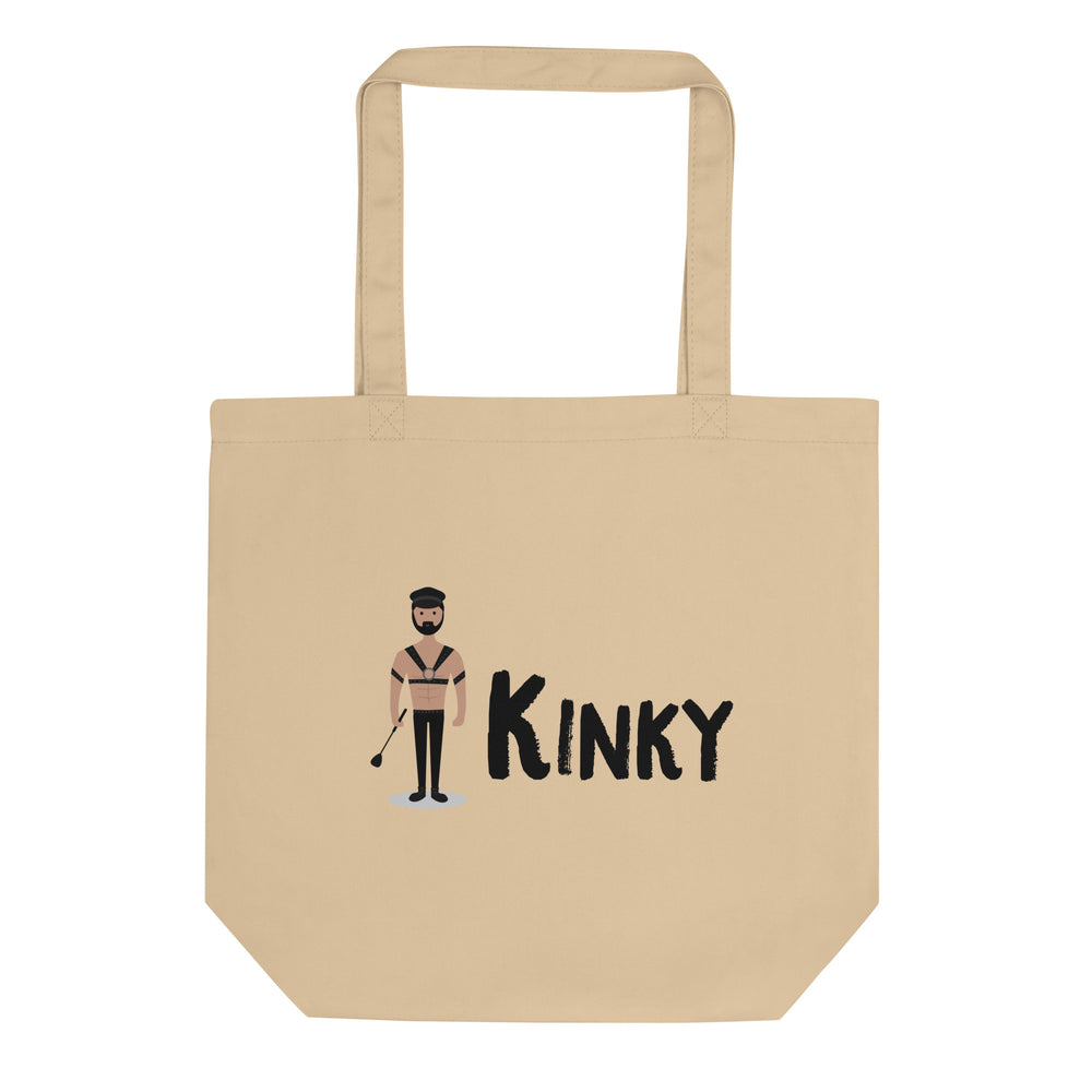 Tan tote bag with a leather-clad figure and the word “KINKY” on the front