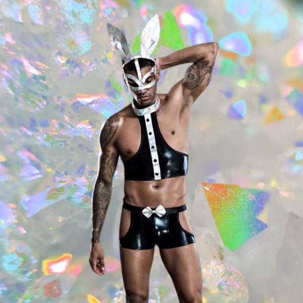 Model wearing a black bunny costume with patent crop top, cutout shorts, bow tie and rabbit mask