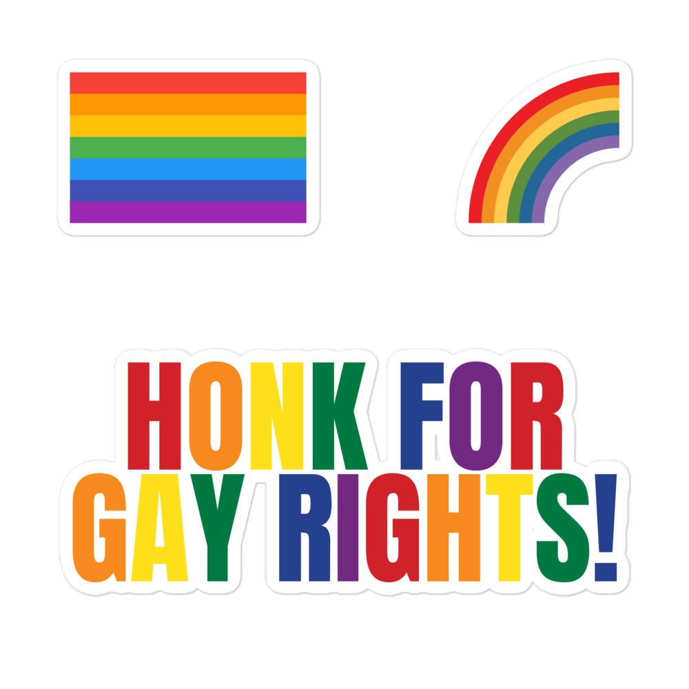 Three rainbow-themed stickers: a flag, a curved rainbow, and “HONK FOR GAY RIGHTS!” text