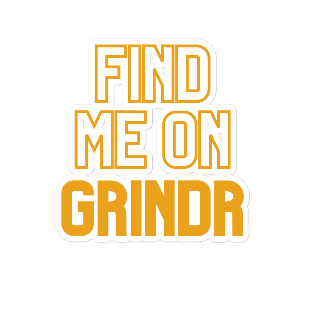 White die-cut sticker reading “FIND ME ON GRINDR” in bold orange letters