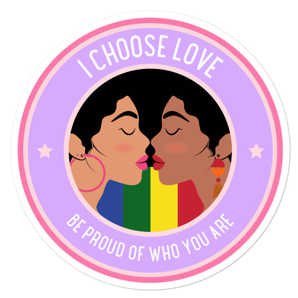 Round sticker reading “I CHOOSE LOVE” and “BE PROUD OF WHO YOU ARE,” with two women kissing