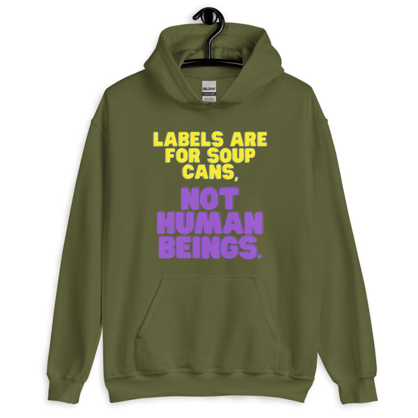 Military green hoodie on a hanger with colorful text, “Labels are for soup cans, not human beings.”
