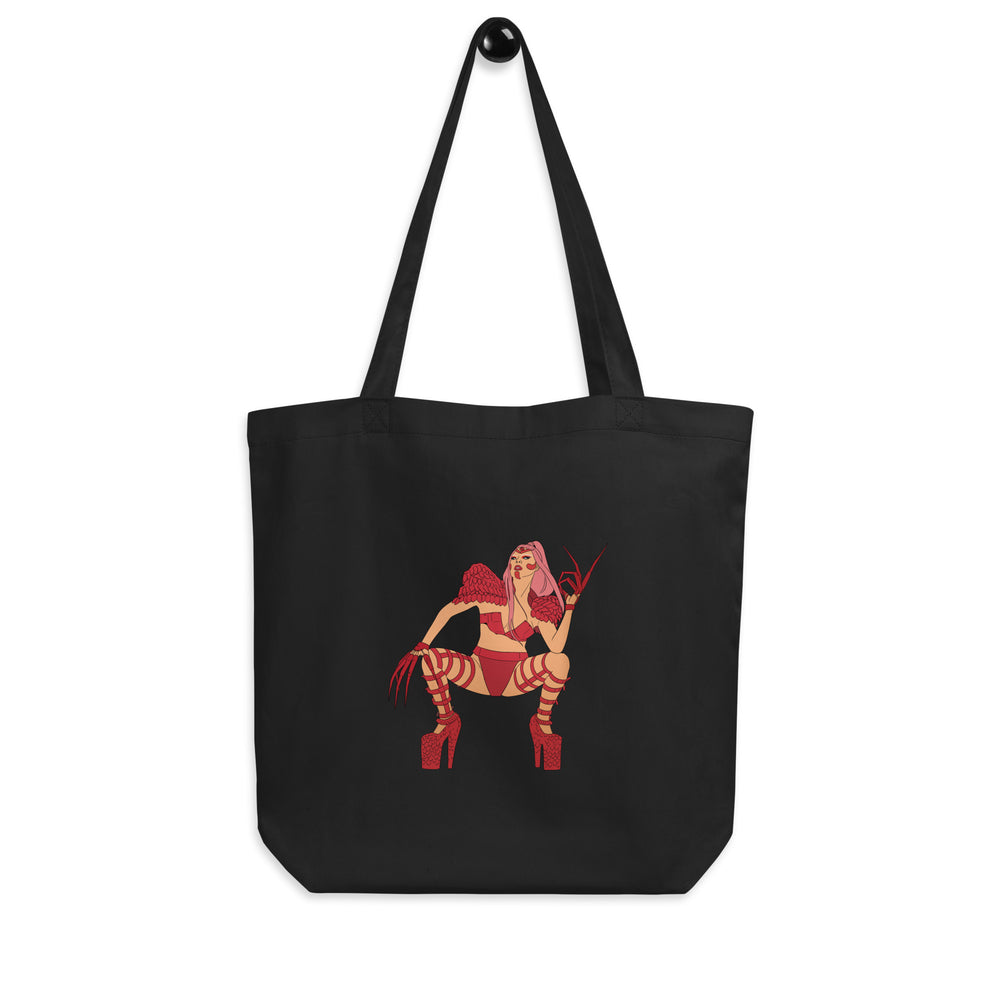 Front view of a black tote bag with a red-and-pink winged character illustration