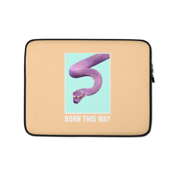 Tan laptop sleeve with black trim, a purple snake graphic, and “BORN THIS WAY” text