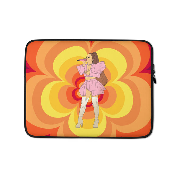 Laptop sleeve with an illustrated singer in pink performing against orange and yellow flower shapes
