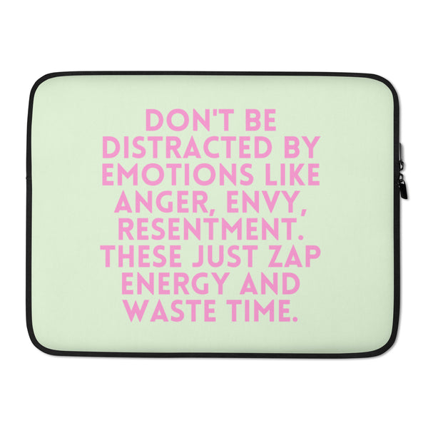 Front view of a pale green laptop sleeve with bold pink text and black trim