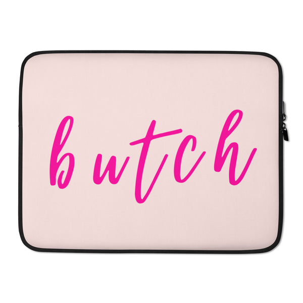 Front view of a pale pink laptop sleeve with black trim and pink “butch” script lettering