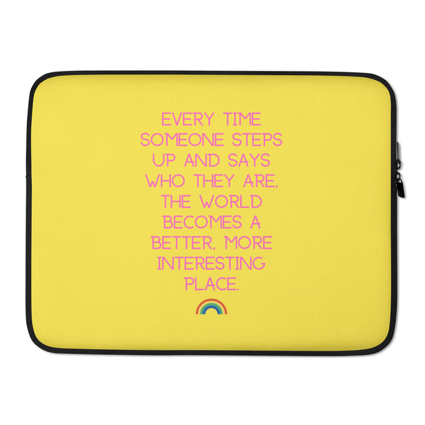 Yellow laptop sleeve with pink text and a small rainbow graphic, front view