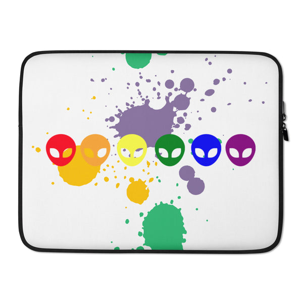 White laptop sleeve with black trim, colorful alien faces, and paint-splatter shapes