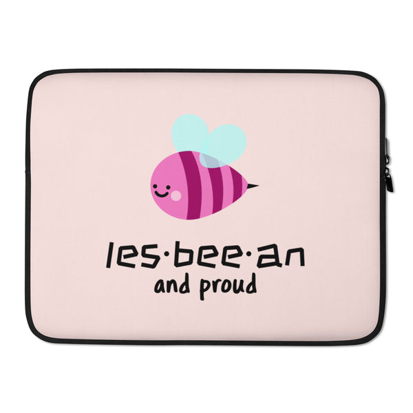 Front view of a pale pink laptop sleeve with a smiling bee and “les-bee-an and proud” text