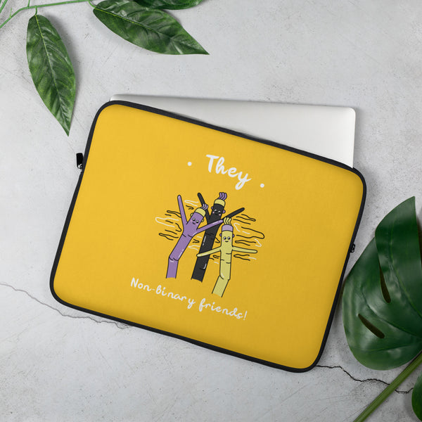 Angled yellow laptop sleeve reading “They Non-binary friends!” with three illustrated figures