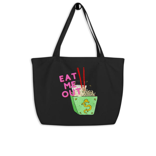 Black organic tote bag with pink “EAT ME OUT” text and a green noodle bowl graphic