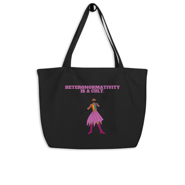 Black tote bag with pink “HETERONORMATIVITY IS A CULT.” text and colorful figure graphic