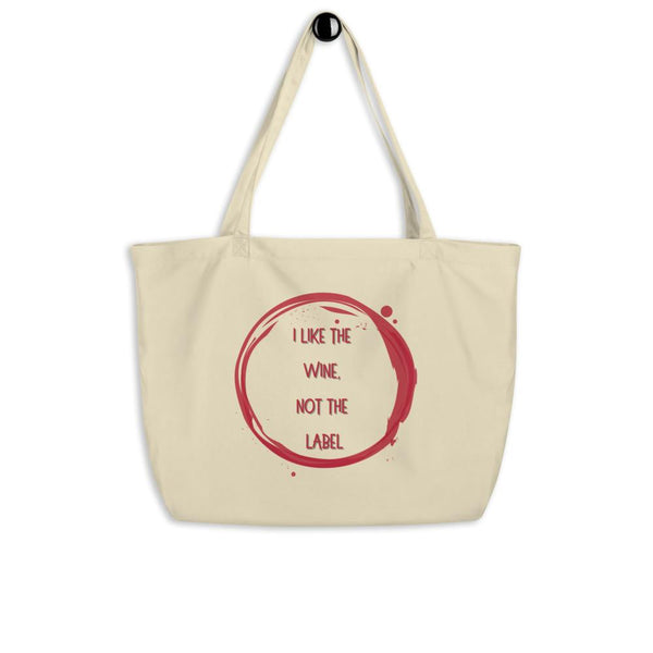 Cream organic tote bag with red circle graphic and “I LIKE THE WINE, NOT THE LABEL” slogan