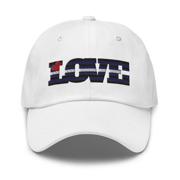 Front view of a white cap embroidered with a red heart and the word “LOVE” in black, blue, and white.