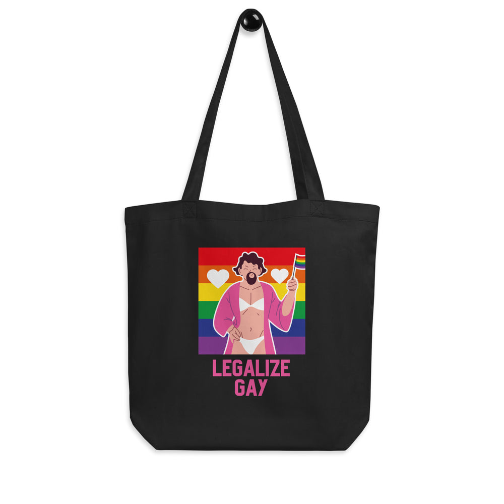 Front-facing black tote bag reading “LEGALIZE GAY,” with a rainbow illustration of a bearded person in lingerie