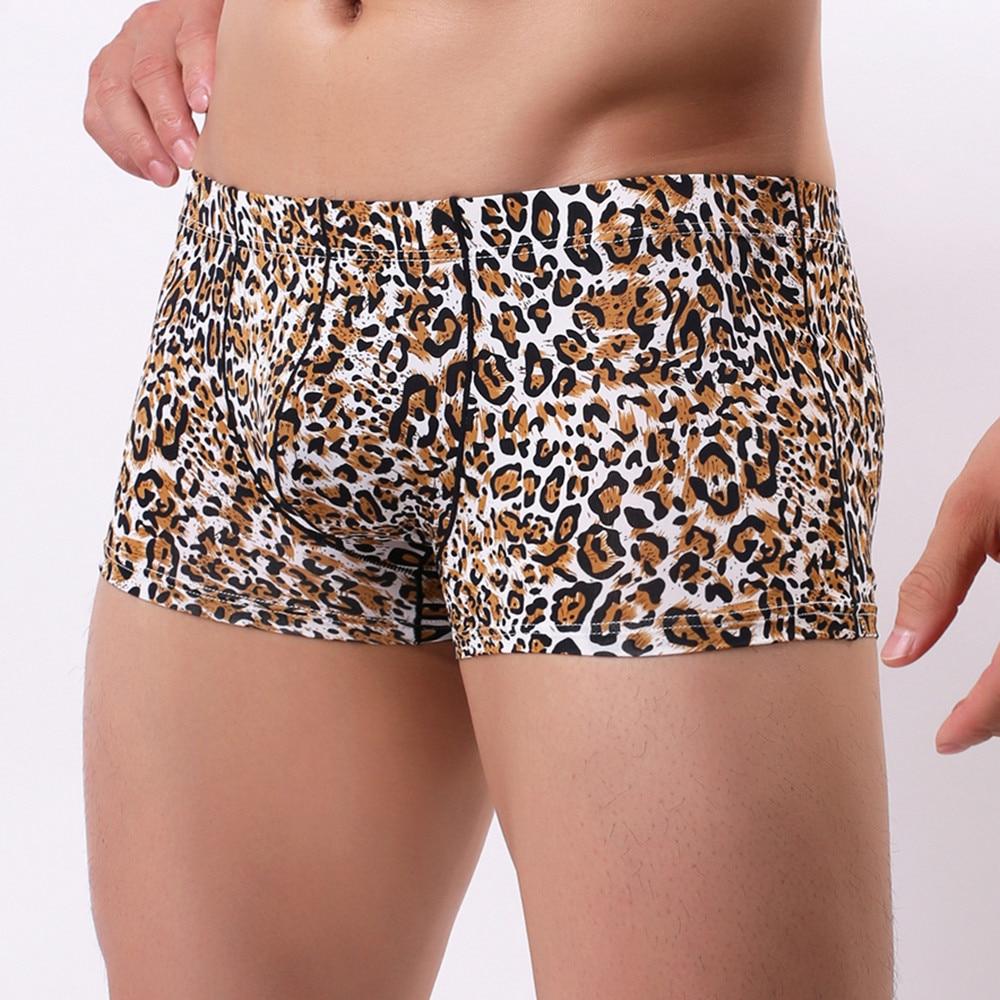 Model wearing leopard-print boxer briefs with a wide elastic waistband