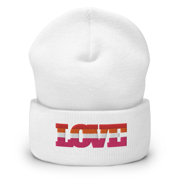 Front view of a white cuffed beanie embroidered with the word “LOVE” in rainbow colors