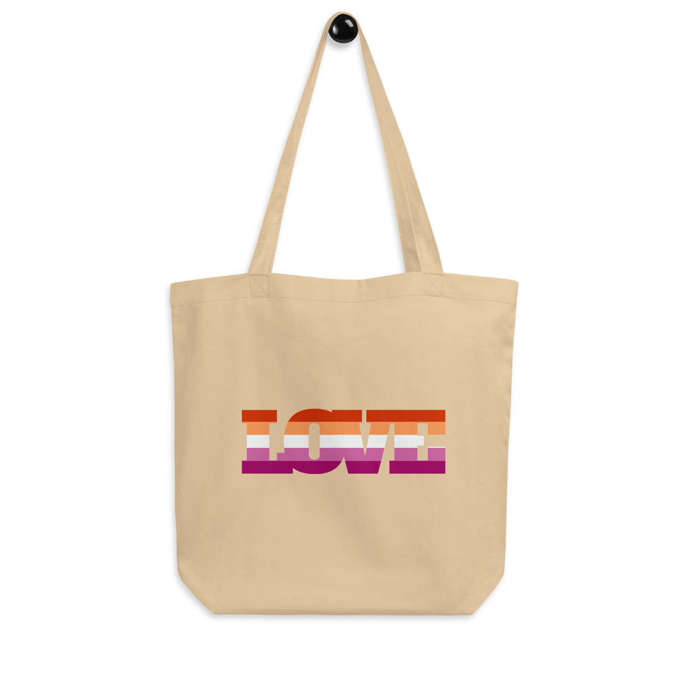 Oyster canvas tote bag with long handles and colorful lesbian flag lettering reading “LOVE”
