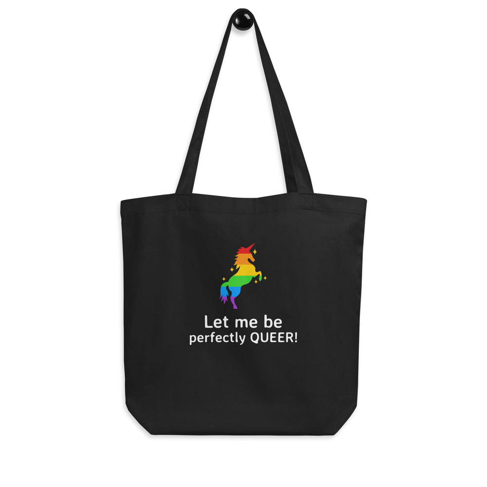 Front-facing black tote bag with a rainbow animal graphic and “Let me be perfectly QUEER!” text