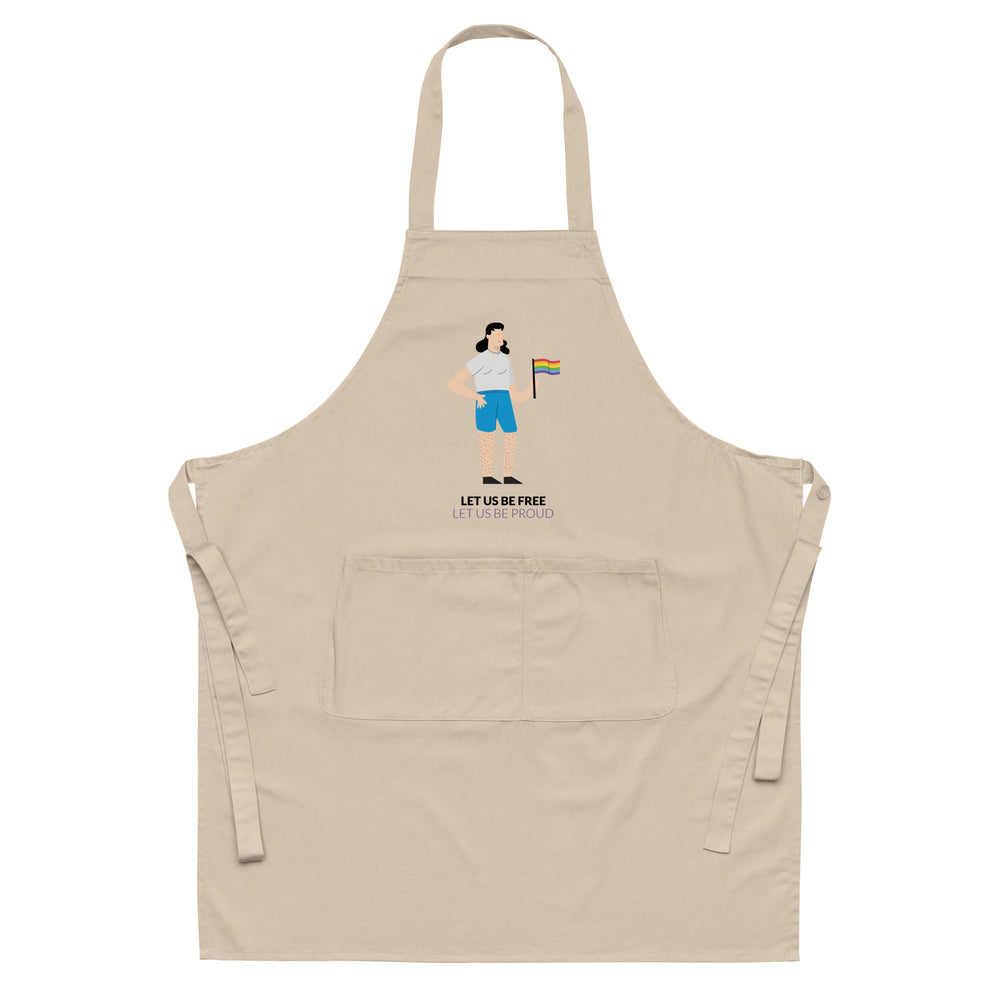 Front view of a beige apron with a person holding a rainbow flag and “LET US BE FREE” text