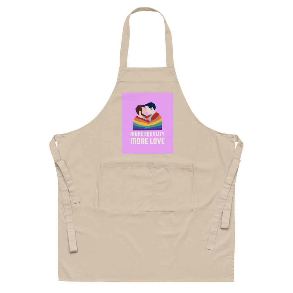 Front view of a beige apron with a rainbow couple graphic and “MORE EQUALITY MORE LOVE” text