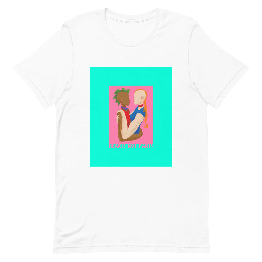 White T-shirt with a colorful illustration of two women embracing and kissing, reading “HEARTS NOT PARTS”