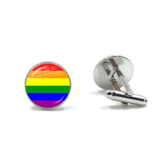 Pair of silver cufflinks, one showing horizontal rainbow Pride stripes and one angled to show its clasp