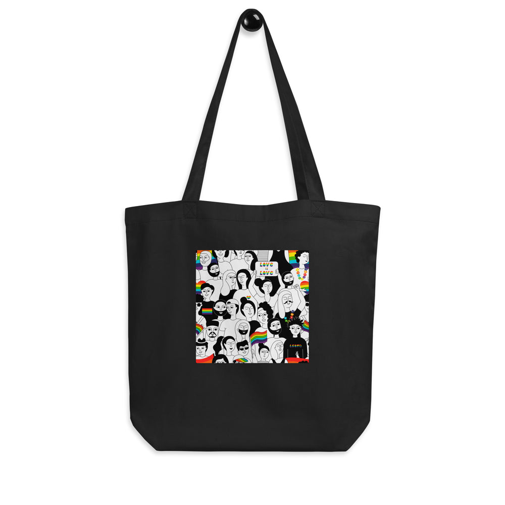 Black tote bag with long straps and a colorful Pride crowd illustration reading “Love is Love”