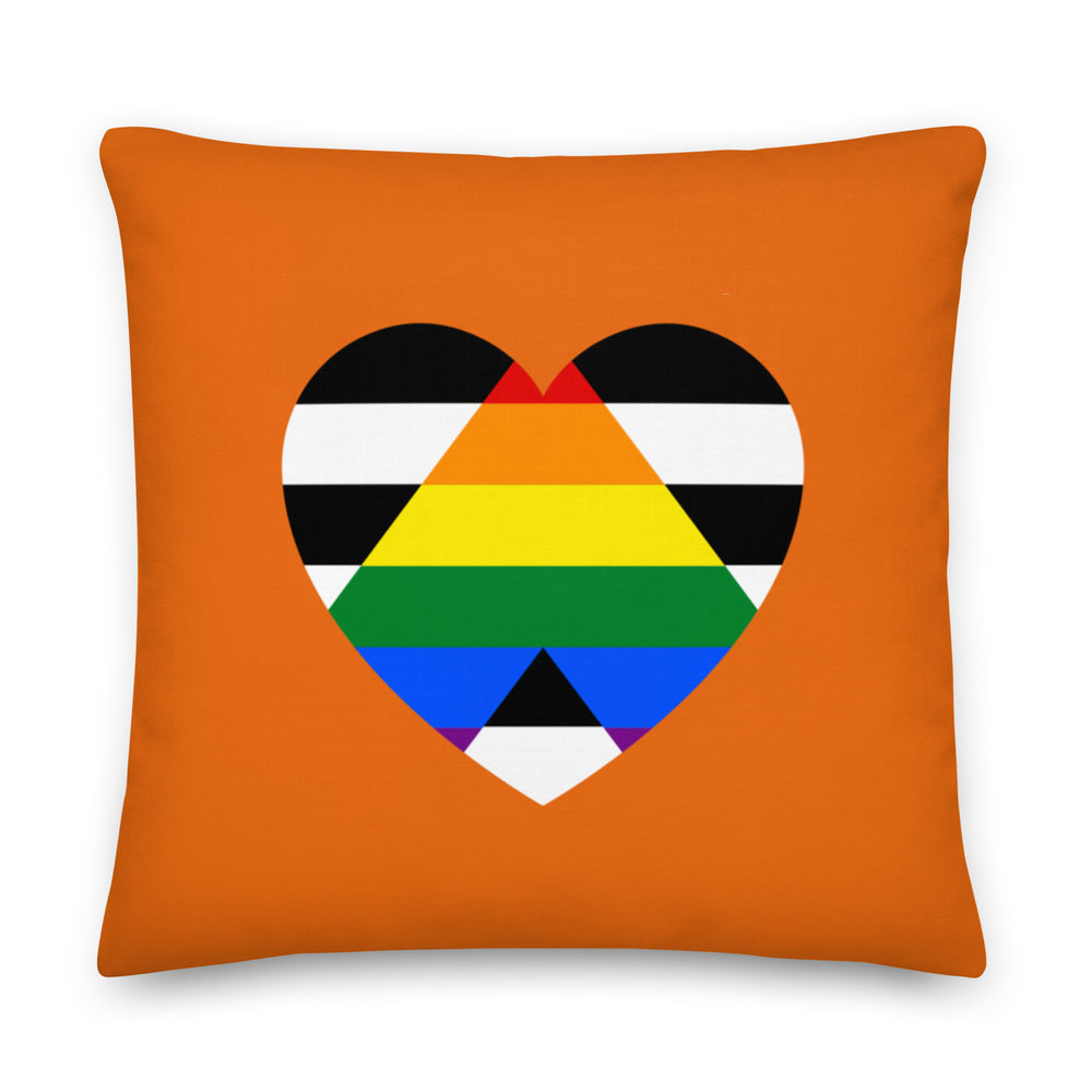 Front-facing orange pillow with a multicolored LGBTQ ally heart design