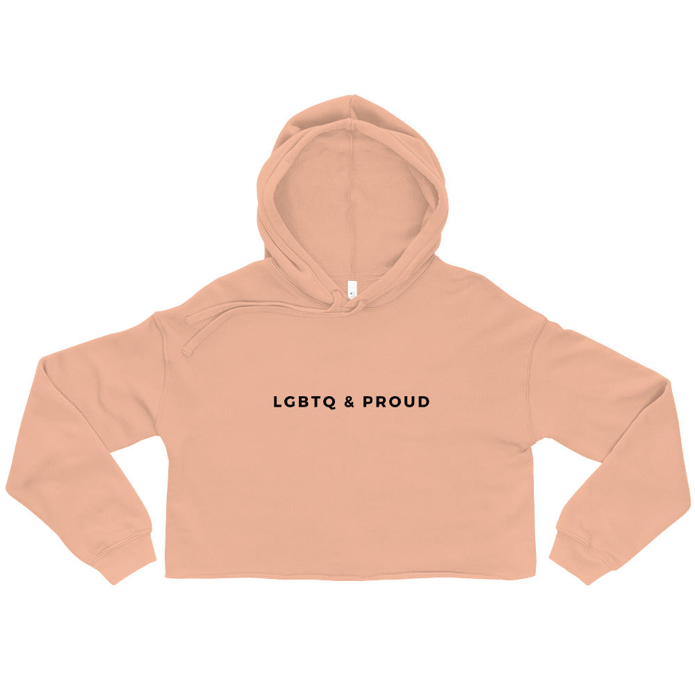 Peach cropped hoodie with a hood and black “LGBTQ & PROUD” chest text