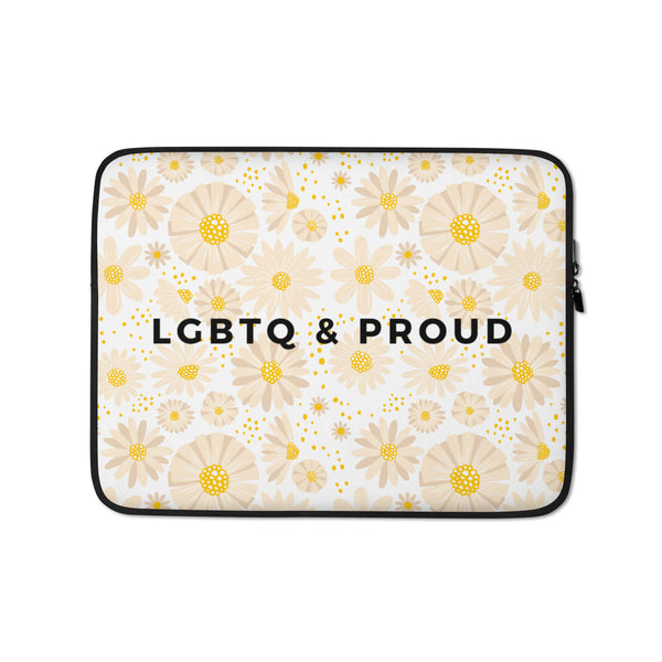 Front-facing laptop sleeve with beige and yellow daisy pattern and “LGBTQ & PROUD” text