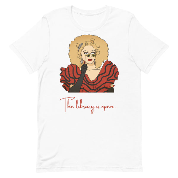 White T-shirt featuring a drag performer illustration and red “The library is open...” text