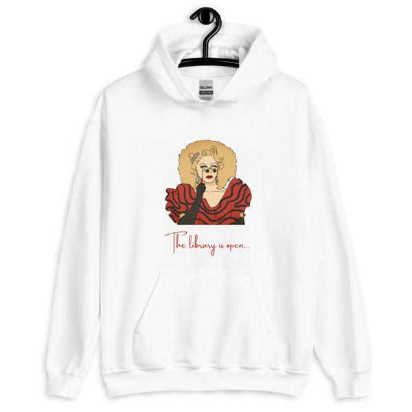 White hoodie on a hanger with a drag queen illustration and “The library is open...” text