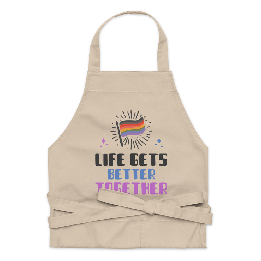 Front view of a beige apron reading “LIFE GETS BETTER TOGETHER” with a rainbow flag graphic