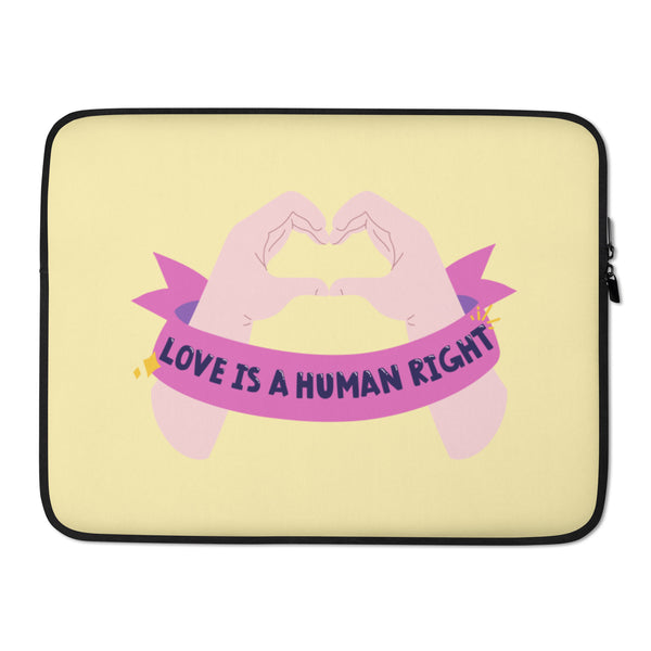 Front view of a pale yellow laptop sleeve with pink hands and a banner reading “LOVE IS A HUMAN RIGHT”